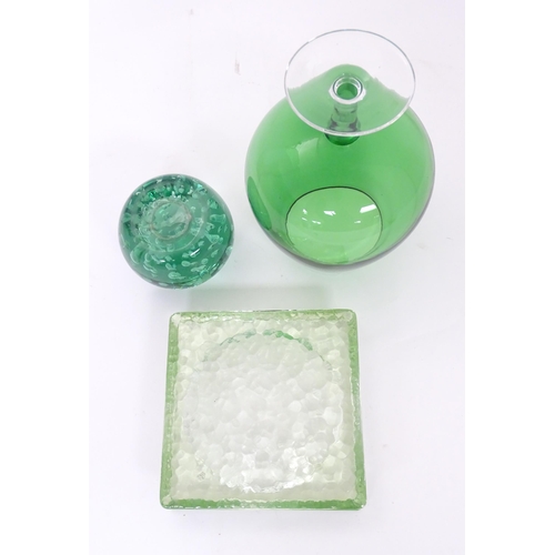 198 - A green glass paperweight / doorstop 4