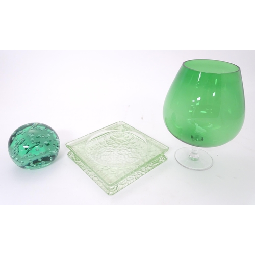 198 - A green glass paperweight / doorstop 4