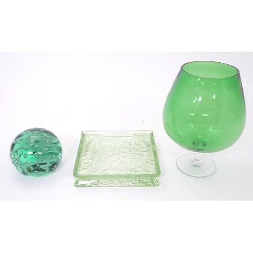 198 - A green glass paperweight / doorstop 4