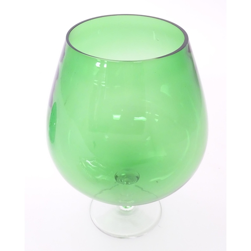 198 - A green glass paperweight / doorstop 4