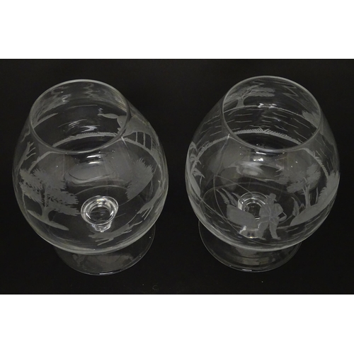 207 - Two drinking glasses / brandy glasses, one with engraved decoration depicting a fisherman, the other... 