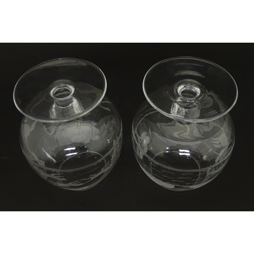 207 - Two drinking glasses / brandy glasses, one with engraved decoration depicting a fisherman, the other... 