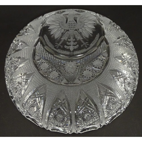 213 - A cut crystal dish with eagle decoration. 12