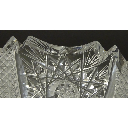 213 - A cut crystal dish with eagle decoration. 12