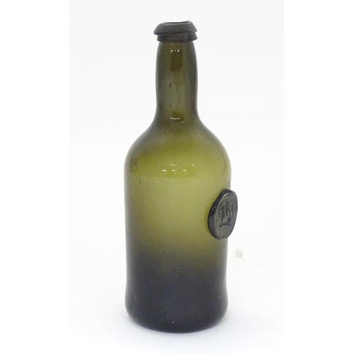 218 - A late 18thC / early 19thC sealed bottle, the light olive glass bottle with dragon seal. ( small siz... 