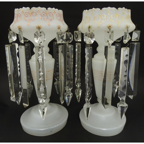 229 - Two Victorian opaque glass table lustres with pink detail and glass lustre drops. Approx. 13 1/2