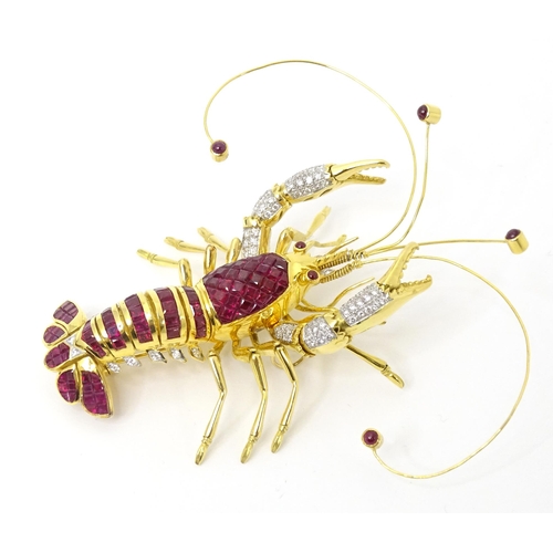 A charming 18ct gold diamond and ruby pendant / brooch formed as a lobster with articulated claws, legs and tail and with en tremblant style antenna and antennule terminating in further rubies.  The diamonds totalling approx. 0.44ct, the rubies totalling approx. 3.03ct. Can be worn as either a brooch or a pendant. The whole approx. 3 1/4" long.