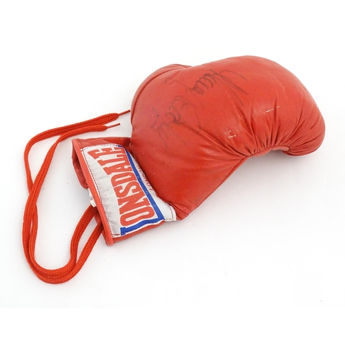 867 - Sporting memorabilia: a Lonsdale boxing glove, bearing the autograph of Sir Henry Cooper OBE KSG (19... 