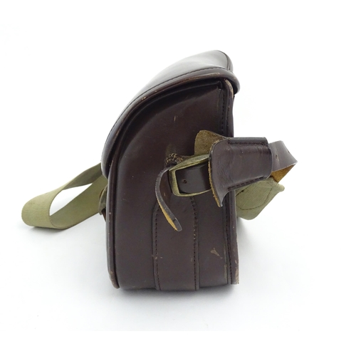 870 - Shooting : a large cartridge bag, constructed from leather with lined interior and canvas strap, pro... 