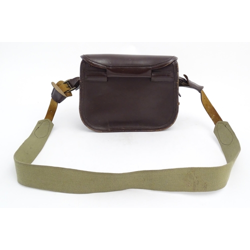 870 - Shooting : a large cartridge bag, constructed from leather with lined interior and canvas strap, pro... 