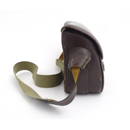 870 - Shooting : a large cartridge bag, constructed from leather with lined interior and canvas strap, pro... 