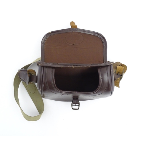 870 - Shooting : a large cartridge bag, constructed from leather with lined interior and canvas strap, pro... 