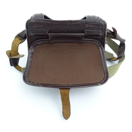 870 - Shooting : a large cartridge bag, constructed from leather with lined interior and canvas strap, pro... 