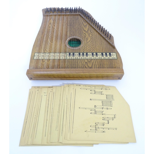 894 - Musical Instrument: a mid 20thC cased zither / autoharp, bearing interior label: 'Supertone Stringed... 