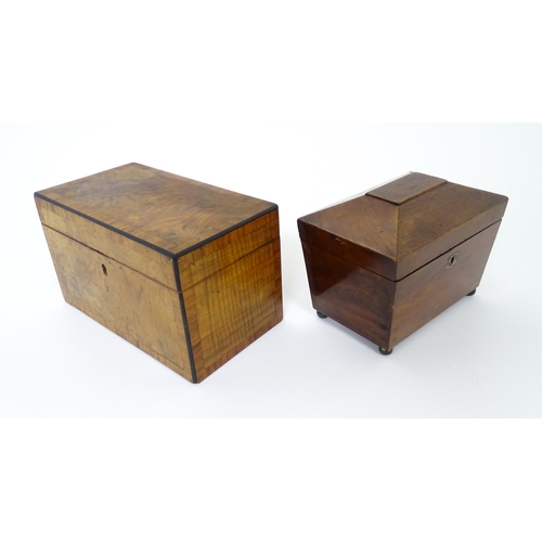 899 - A 19thC walnut tea caddy with crossbanding, opening to reveal two hinge lidded sections within. Toge... 