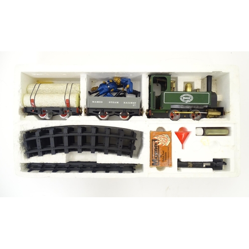 119B - Toy: A Mamod model Live Steam Railway Goods Train set RS1, with locomotive, wagons, track, etc. With... 