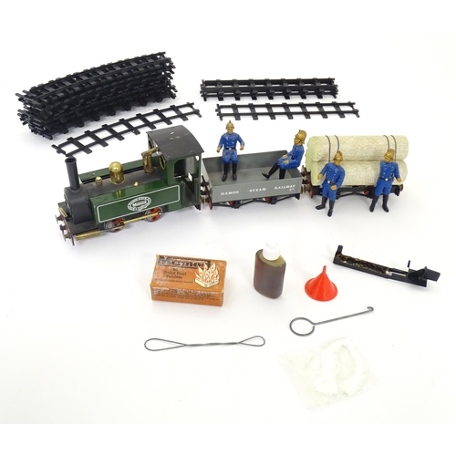 119B - Toy: A Mamod model Live Steam Railway Goods Train set RS1, with locomotive, wagons, track, etc. With... 