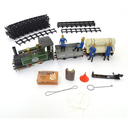 119B - Toy: A Mamod model Live Steam Railway Goods Train set RS1, with locomotive, wagons, track, etc. With... 