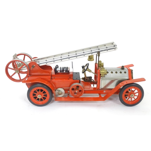 119D - Toys: A Mamod model Live Steam Fire Engine FE1, with original box. Together with a Mamod Lumber Wago... 