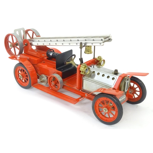 119D - Toys: A Mamod model Live Steam Fire Engine FE1, with original box. Together with a Mamod Lumber Wago... 