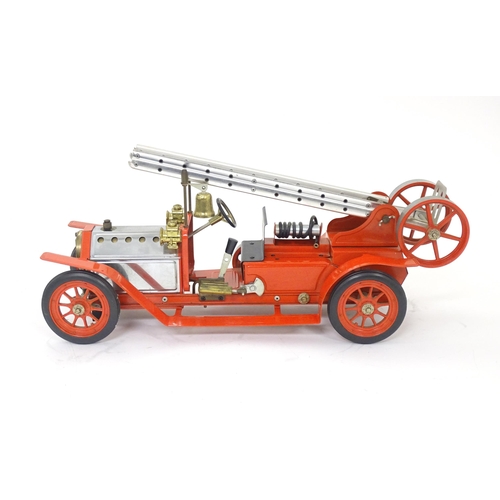 119D - Toys: A Mamod model Live Steam Fire Engine FE1, with original box. Together with a Mamod Lumber Wago... 