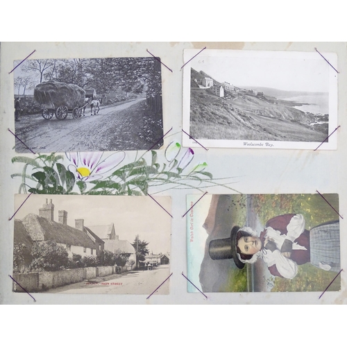 1960 - A Japanese photograph album with lacquered boards, the cover decorated with inlaid mother of pearl a... 