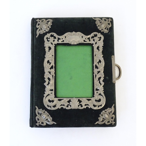 1971 - A Victorian photograph / carte de visite album, having a green velvet cover and applied scrolling fl... 