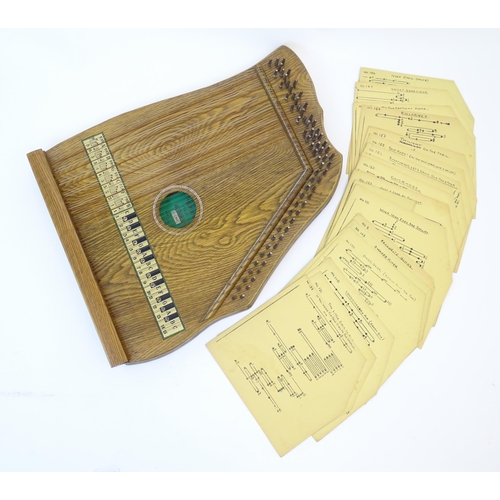 894 - Musical Instrument: a mid 20thC cased zither / autoharp, bearing interior label: 'Supertone Stringed... 