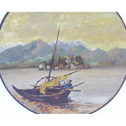 897 - A 20thC tambourine, the drum painted in oils depicting a Continental lake scene with fisherman, boat... 