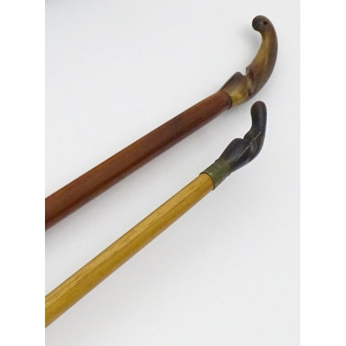 878 - Mid 20thC Archery items, comprising two wooden bows with cloth cases, one marked F H Ayres, London -... 