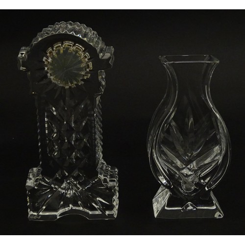 104 - A quantity of assorted crystal / glassware to include a pair of candlesticks by Baccarat, together w... 