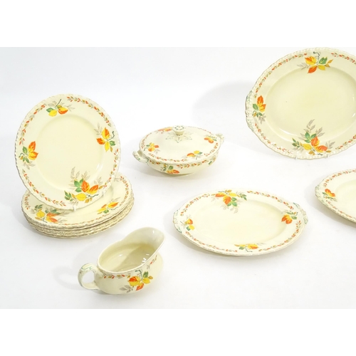 189 - A quantity of Grindley dinner wares in the pattern The Holly Leaves, to include oval serving plates,... 