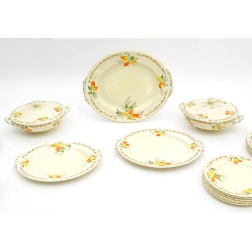 189 - A quantity of Grindley dinner wares in the pattern The Holly Leaves, to include oval serving plates,... 