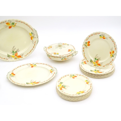 189 - A quantity of Grindley dinner wares in the pattern The Holly Leaves, to include oval serving plates,... 