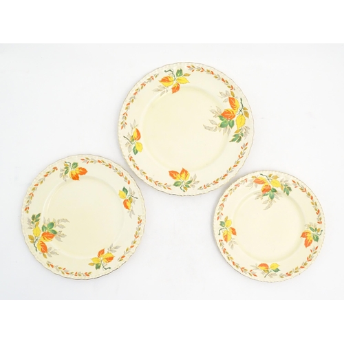 189 - A quantity of Grindley dinner wares in the pattern The Holly Leaves, to include oval serving plates,... 