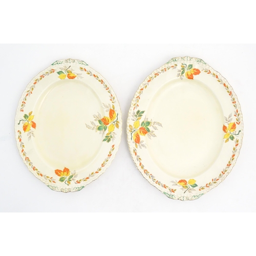 189 - A quantity of Grindley dinner wares in the pattern The Holly Leaves, to include oval serving plates,... 