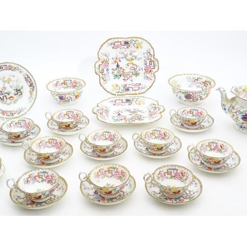 193 - A quantity of assorted 19thC Chinese Tree tea wares, pattern no. 2067, to include teapot, cups, sauc... 