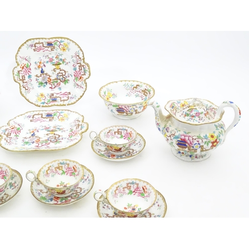 193 - A quantity of assorted 19thC Chinese Tree tea wares, pattern no. 2067, to include teapot, cups, sauc... 