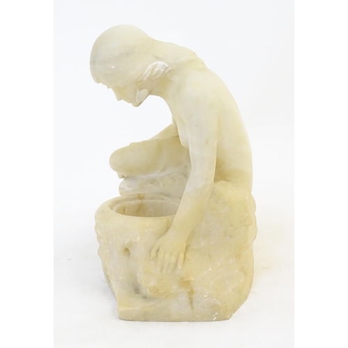 41 - A late 19th / early 20thC Continental alabaster model of a seated female nude, in the manner of Ferd... 