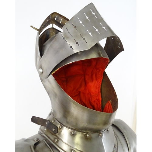 1815 - Militaria: a 20thC medieval style display/novelty suit of armour, constructed from articulated steel... 