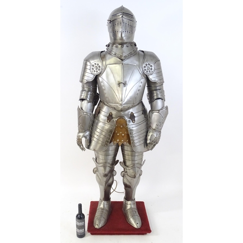 1815 - Militaria: a 20thC medieval style display/novelty suit of armour, constructed from articulated steel... 