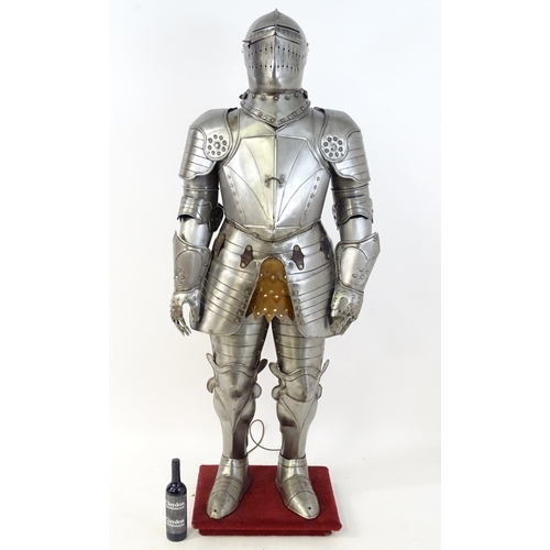 1815 - Militaria: a 20thC medieval style display/novelty suit of armour, constructed from articulated steel... 