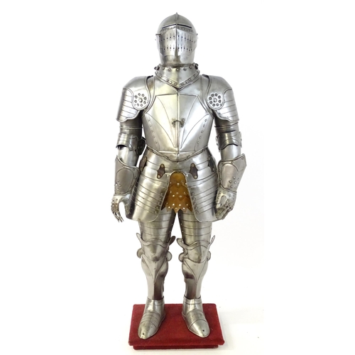 1815 - Militaria: a 20thC medieval style display/novelty suit of armour, constructed from articulated steel... 