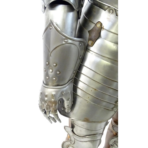 1815 - Militaria: a 20thC medieval style display/novelty suit of armour, constructed from articulated steel... 