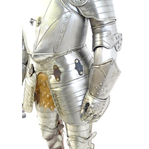 1815 - Militaria: a 20thC medieval style display/novelty suit of armour, constructed from articulated steel... 