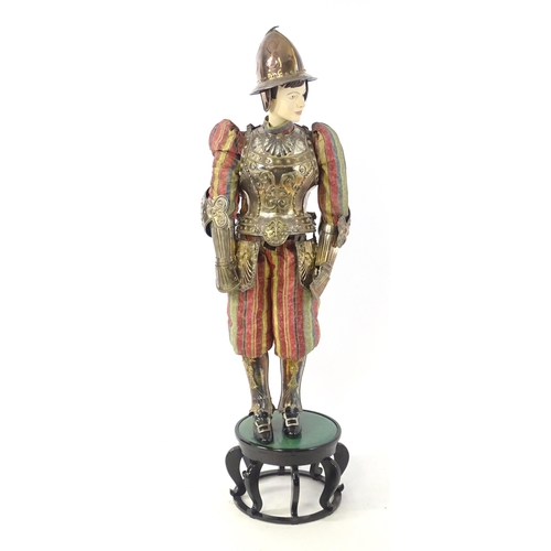 1818 - Militaria: a 20thC Papal Guard style display suit of armour, constructed from silver plated panels a... 