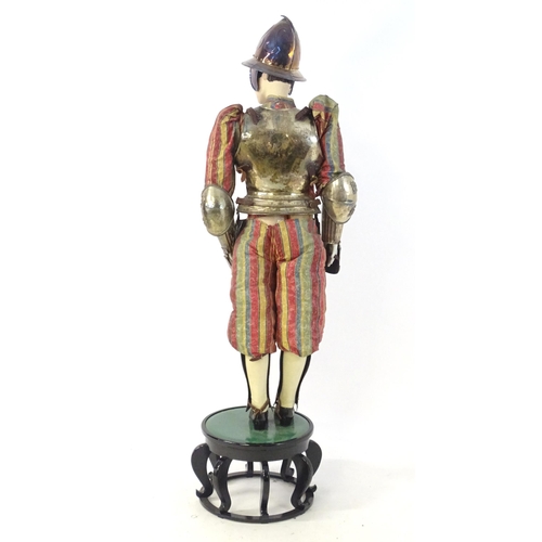 1818 - Militaria: a 20thC Papal Guard style display suit of armour, constructed from silver plated panels a... 