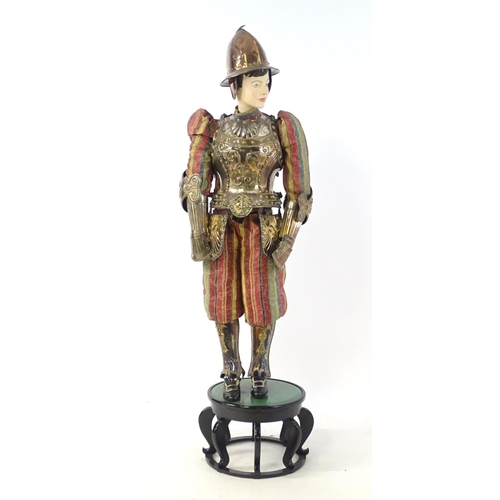 1818 - Militaria: a 20thC Papal Guard style display suit of armour, constructed from silver plated panels a... 