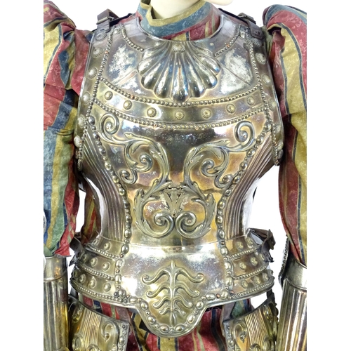 1818 - Militaria: a 20thC Papal Guard style display suit of armour, constructed from silver plated panels a... 