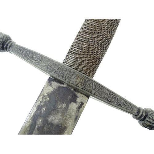 1803 - Militaria / Arms & Armour : two 20thC Spanish swords, comprising a Colada (with 33 3/4